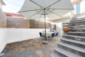 Patio alebo iná vonkajšia časť ubytovania Valentino