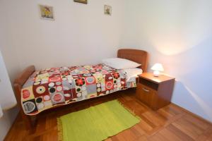 Postel nebo postele na pokoji v ubytování Apartments Hana