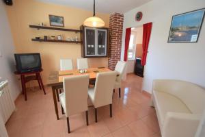 Kuchyň nebo kuchyňský kout v ubytování Apartments Hana