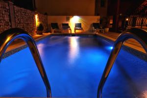 Bazén v ubytovaní Holiday House Pudarica alebo v jeho blízkosti