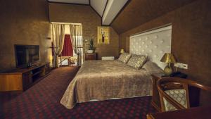Postel nebo postele na pokoji v ubytování Park-Hotel Golosievo + 37 fotografií