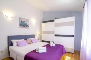 Postel nebo postele na pokoji v ubytování Villa Katja + 37 fotografií