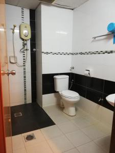 Koupelna v ubytování Hotel Damai + 22 fotografií