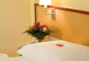 Postel nebo postele na pokoji v ubytování Montana Hotel