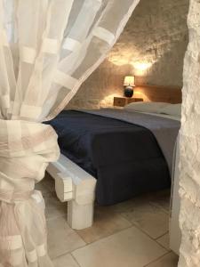 Voodi või voodid majutusasutuse Borgo D'Itria toas