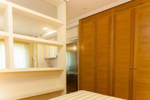 A bed or beds in a room at Apartamentos Tres Luces