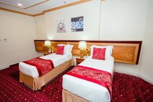 Postel nebo postele na pokoji v ubytování Sama Al Deafah Hotel