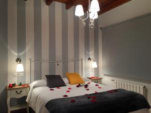Кровать или кровати в номере Liencres Apartamentos