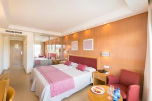 Uma cama ou camas num quarto em HSM Atlantic Park