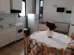 Kuchyň nebo kuchyňský kout v ubytování Il Rifugio dell'Ape Agriturismo + 14 fotografií