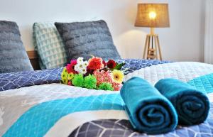 Posteľ alebo postele v izbe v ubytovaní SPA Polanki PARK Nemo Apartamenty Kołobrzeg