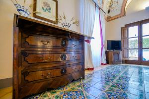 TV a/nebo společenská místnost v ubytování Hotel Villa Cimbrone