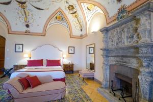 Postel nebo postele na pokoji v ubytování Hotel Villa Cimbrone