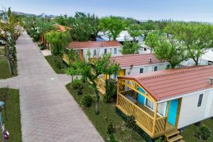 an overhead view of a house with a roof at Camping Tredue in Sottomarina