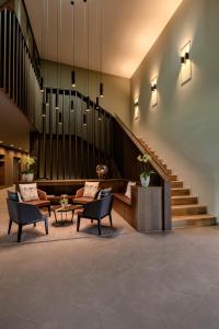 Posezení v ubytování Gasthaus Badhof - Golfhotel