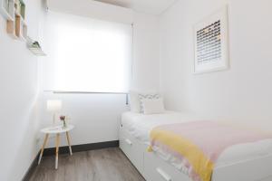 Posteľ alebo postele v izbe v ubytovaní Hola Málaga Premium Centro