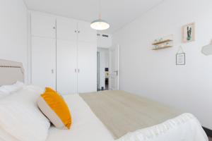 Posteľ alebo postele v izbe v ubytovaní Hola Málaga Premium Centro