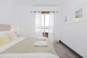 Posteľ alebo postele v izbe v ubytovaní Hola Málaga Premium Centro