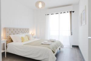 Posteľ alebo postele v izbe v ubytovaní Hola Málaga Premium Centro