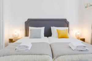 Posteľ alebo postele v izbe v ubytovaní Hola Málaga Premium Centro