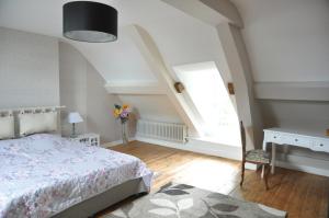 Cama o camas de una habitación en Clairefontaine Chambre d'Hôtes
