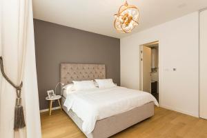 Postel nebo postele na pokoji v ubytování Perla Apartmani Split