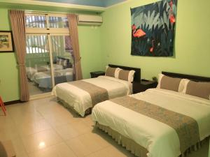 Letto o letti in una camera di Home Inn