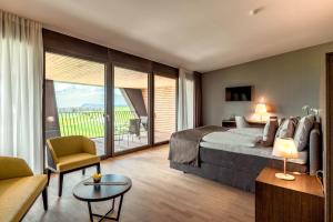 Postel nebo postele na pokoji v ubytování Gasthaus Badhof - Golfhotel