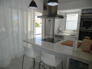 Kuchnia lub aneks kuchenny w obiekcie Casas Holiday - El Mirador de Villamartin