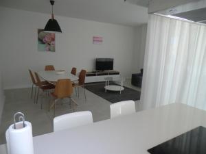 Telewizja i/lub zestaw kina domowego w obiekcie Casas Holiday - El Mirador de Villamartin