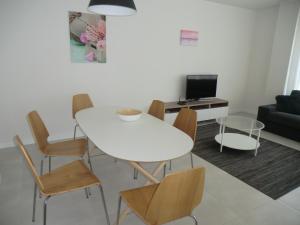 Telewizja i/lub zestaw kina domowego w obiekcie Casas Holiday - El Mirador de Villamartin