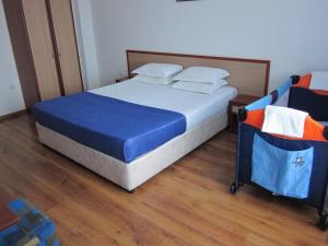 Postel nebo postele na pokoji v ubytování Albatros 2 Family Hotel