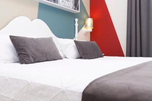 Postel nebo postele na pokoji v ubytování Hotel Carlos V