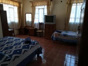 Voodi või voodid majutusasutuse Apartamento Golden toas