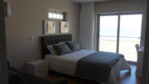 Postel nebo postele na pokoji v ubytování CMB Guesthouse