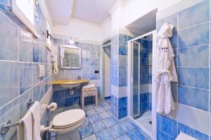 Phòng tắm tại Il Gattopardo Hotel Terme & Beauty Farm