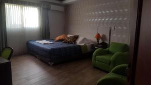 Postel nebo postele na pokoji v ubytování Hotel Damys