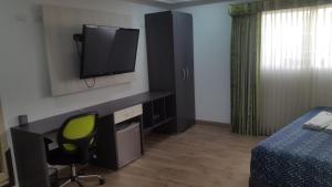 TV a/nebo společenská místnost v ubytování Hotel Damys + 21 fotografií