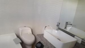 Koupelna v ubytování Hotel Damys