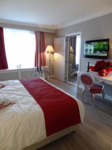 Postel nebo postele na pokoji v ubytování Ara Dune Hotel
