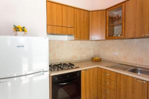 A kitchen or kitchenette at Furore Coast Rooms