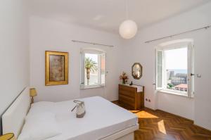 Posteľ alebo postele v izbe v ubytovaní Apartment Entre les jardins