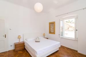 Posteľ alebo postele v izbe v ubytovaní Apartment Entre les jardins