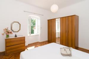 Posteľ alebo postele v izbe v ubytovaní Apartment Entre les jardins