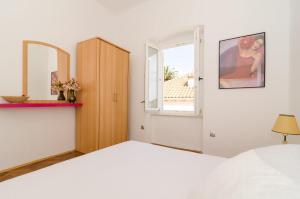 Posteľ alebo postele v izbe v ubytovaní Apartment Entre les jardins