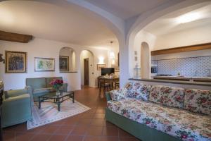 a living room with a couch and a table at Villa Agostoli in Siena