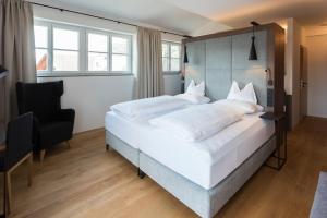 Postelja oz. postelje v sobi nastanitve Boutique Hotel Aichinger