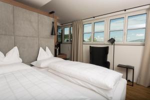 Postelja oz. postelje v sobi nastanitve Boutique Hotel Aichinger