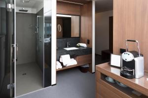 Kopalnica v nastanitvi Boutique Hotel Aichinger