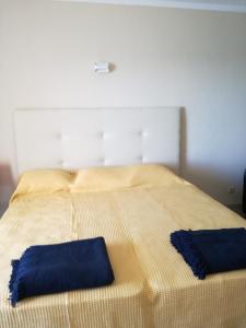 A bed or beds in a room at Estrela do Mar - by Portugalferias